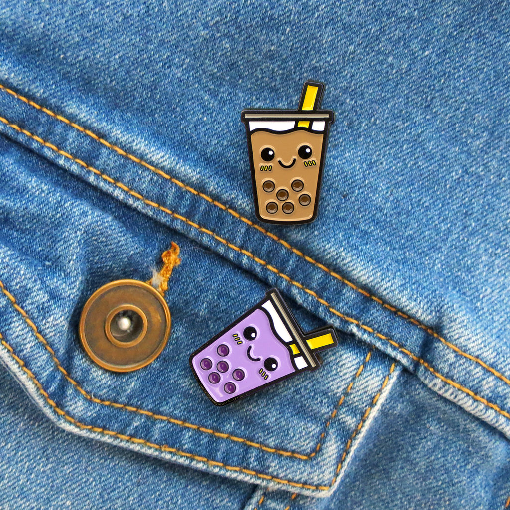 Boba Enamel Pins on jean jacket pocket