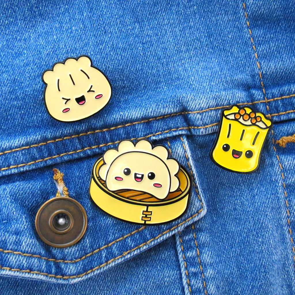 Dim Sum enamel pins on jean jacket pocket