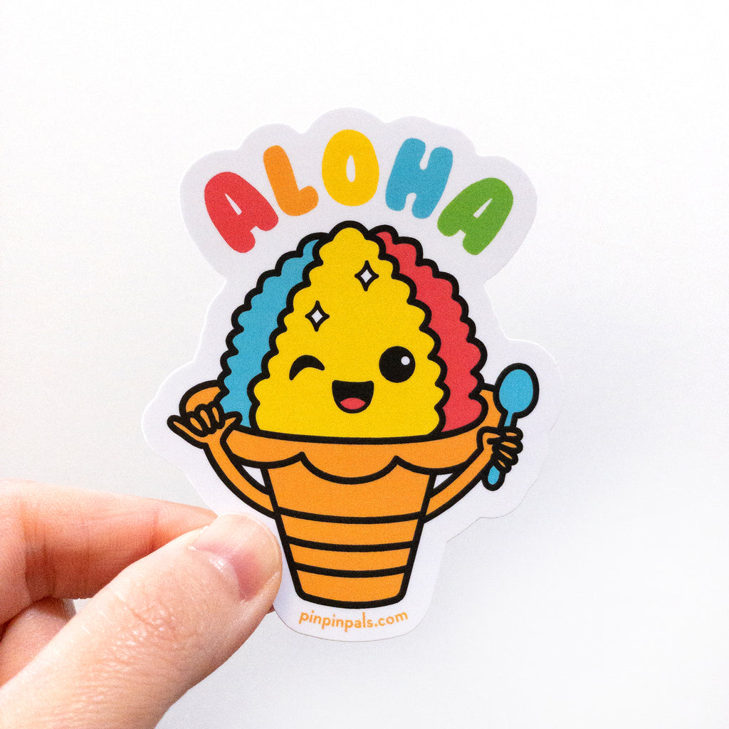 Hand holding a Aloha Shaved Iced vinyl sticker