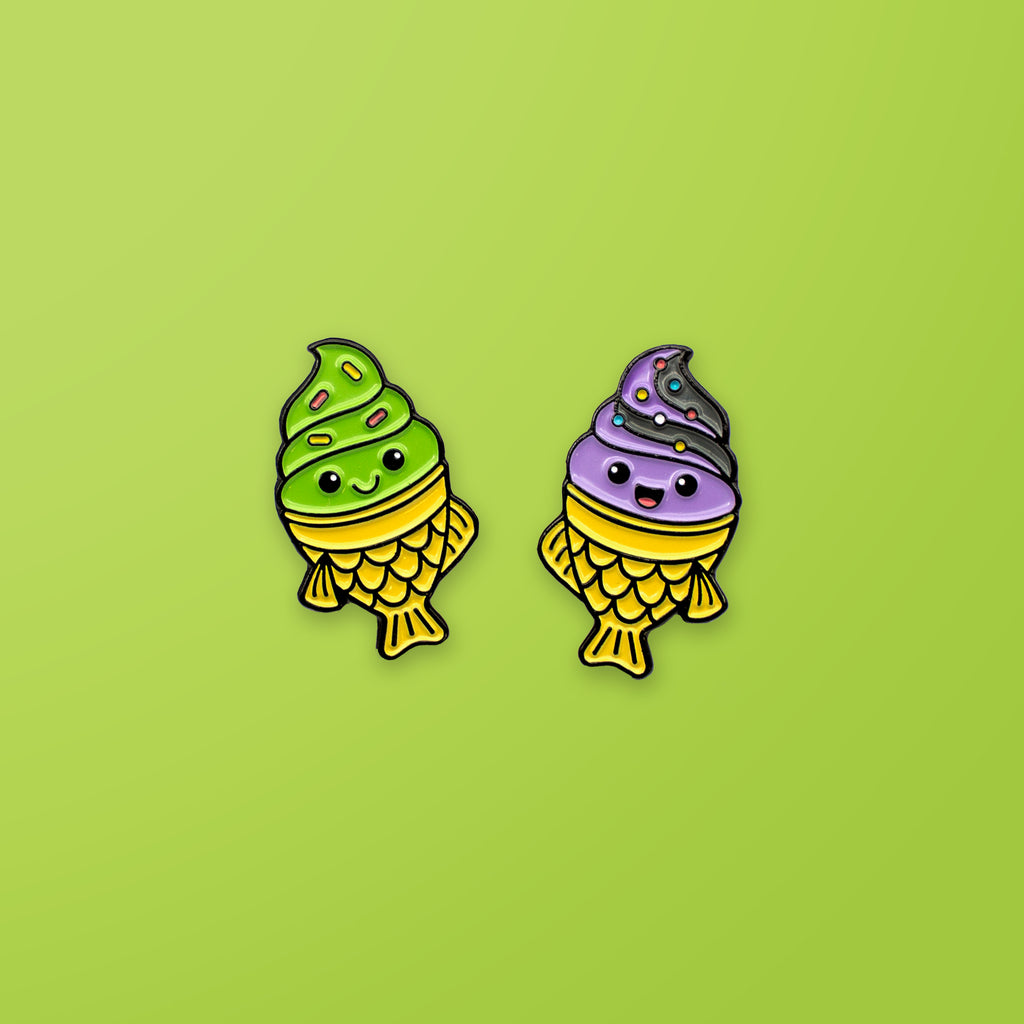 Taiyaki enamel pin set on green background